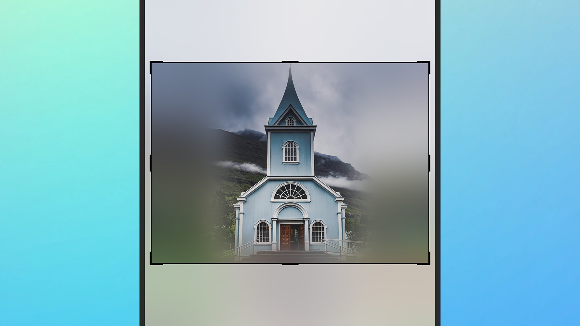 Blue wooden church with a tall steeple shown inside a device frame, set against a gradient blue-green background (image appears as a photo within a screen).