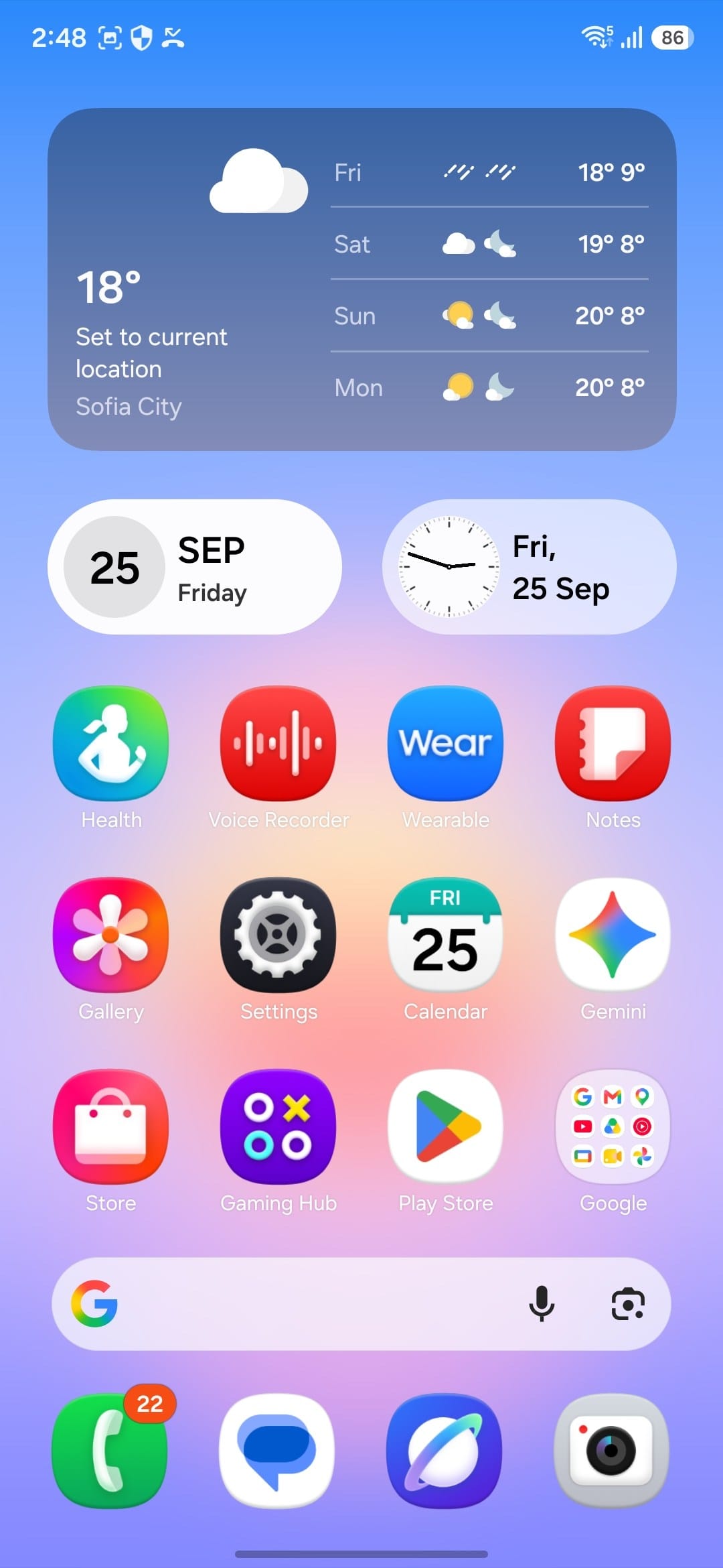 Screenshot of a smartphone home screen showing weather widget, date, time, and app icons on a gradient background.