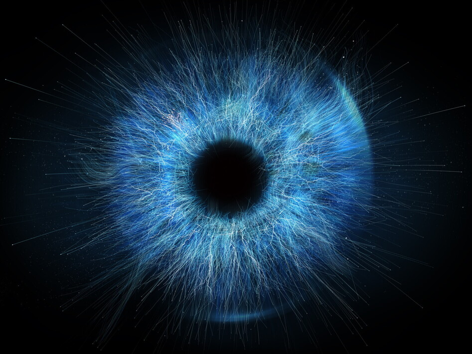 Close-up of a vivid blue iris with radiating light filaments against a dark background.