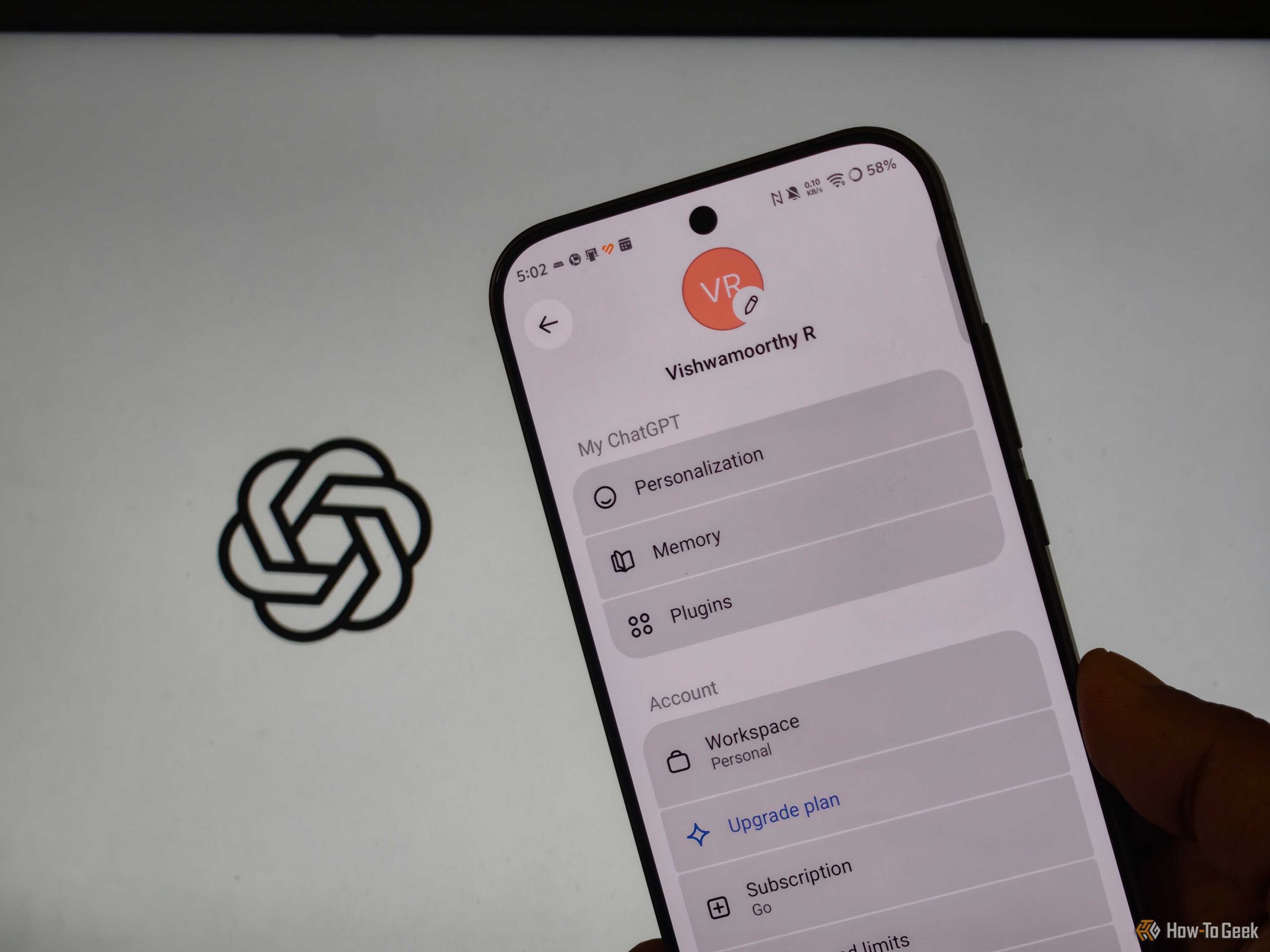 Close-up of a smartphone screen showing a user profile with an orange circular VR icon and a settings list (Personalization, Plugins, Memory).