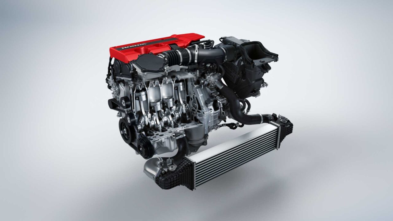 High-performance car engine with a red intake cover and exposed metallic components on a light gradient background