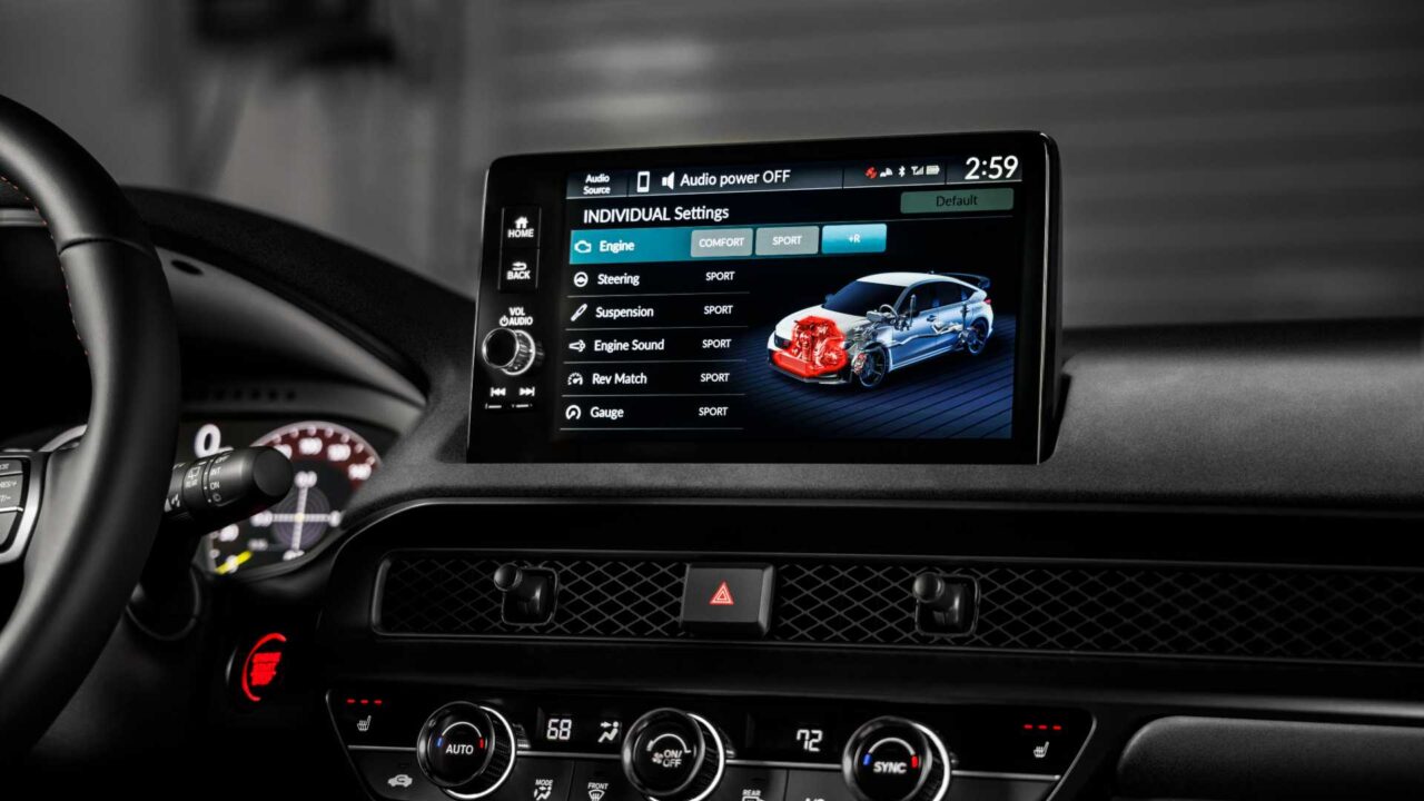 In-car infotainment screen showing Individual Settings with engine options and a car diagram on the right, in a dark interior panel.