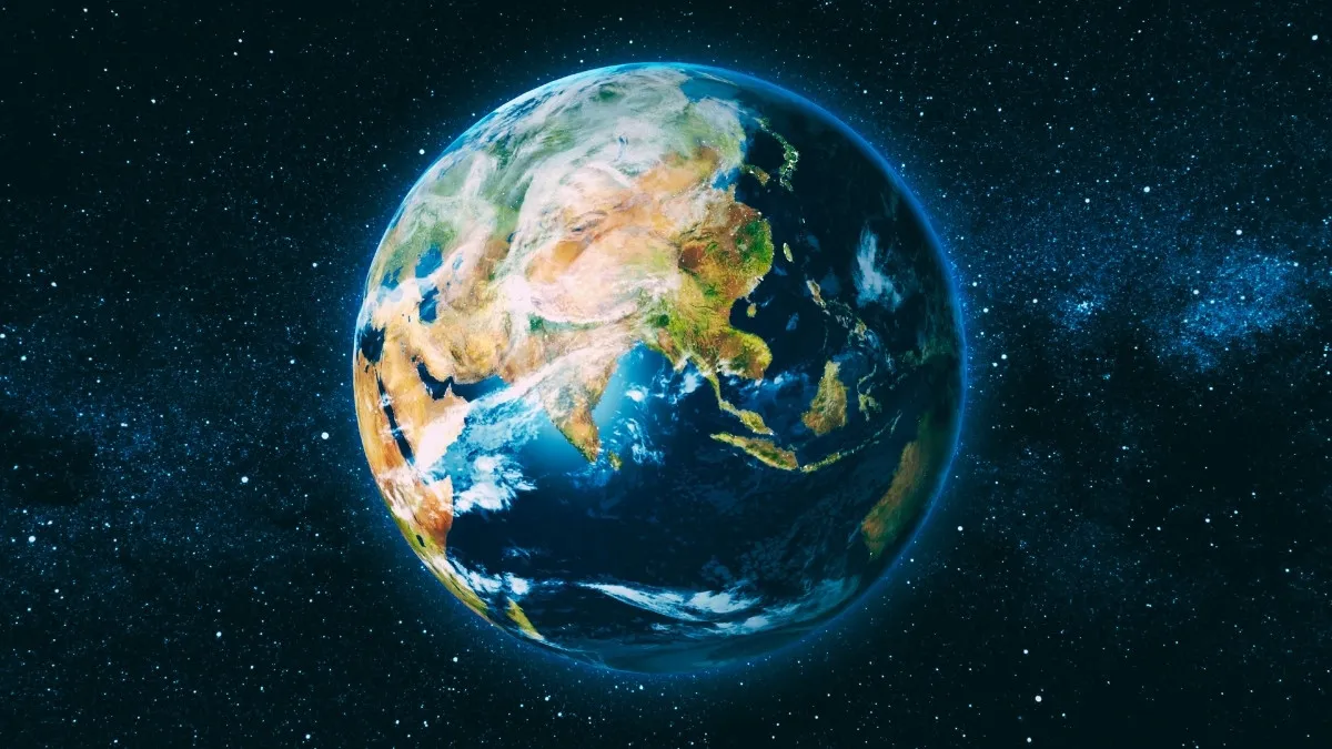 Earth from space: colorful globe with continents and oceans, set against a starry background.