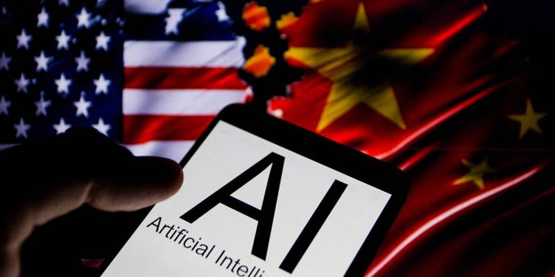 Smartphone showing 'AI' with subtext 'Artificial Intelligence', held in front of US and China flags in the background.