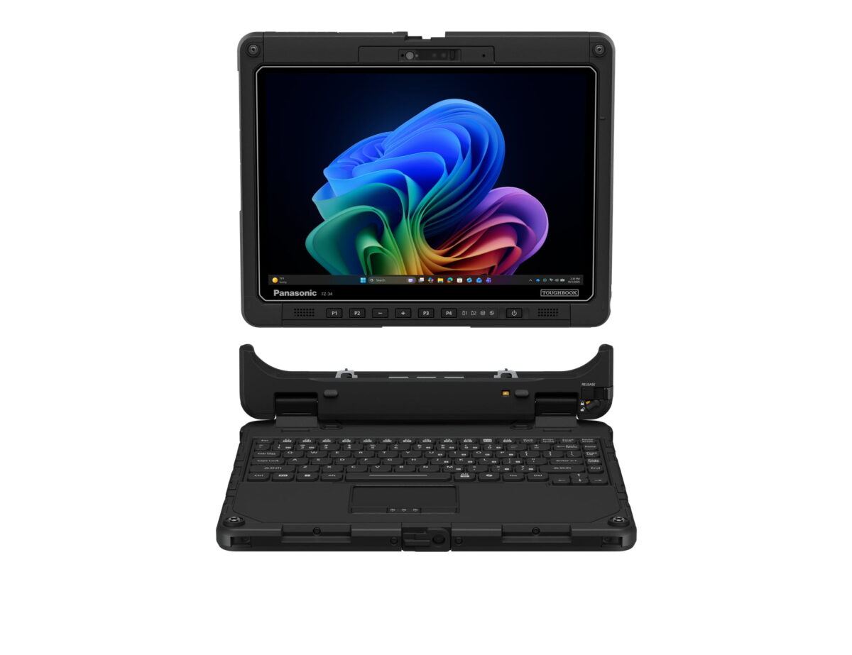 نمای روبه‌رو از تبلت صنعتی مقاوم Panasonic TOUGHBOOK FZ-34 با صفحه روشن و پس‌زمینه رنگی ویندوز ۱۱، به همراه داک کیبورد مقاوم جداشده در پایین با نور پس‌زمینه کلیدها و تاچ‌پد در پس‌زمینه مشکی.