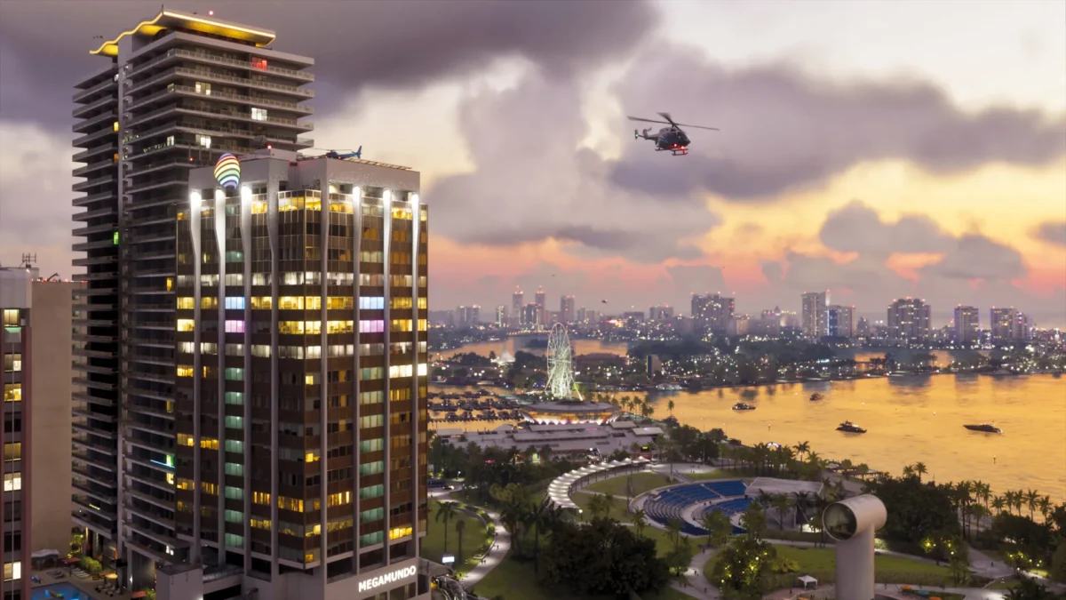 نمای شهر Vice City در بازی GTA 6 با آسمان‌خراش‌های نورانی، بالگرد و قایق‌های در حال حرکت هنگام غروب 