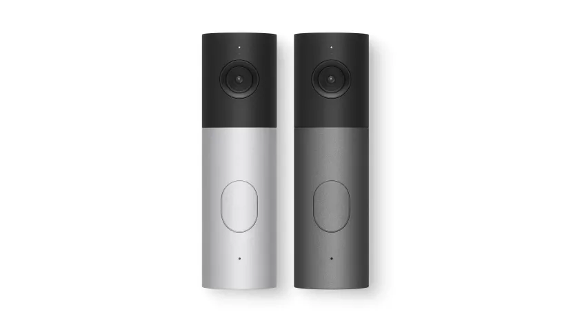 دو مدل زنگ در تصویری (Video Doorbell) عمودی و باریک در رنگ‌های نقره‌ای و خاکستری تیره با دوربین و دکمه مرکزی.
