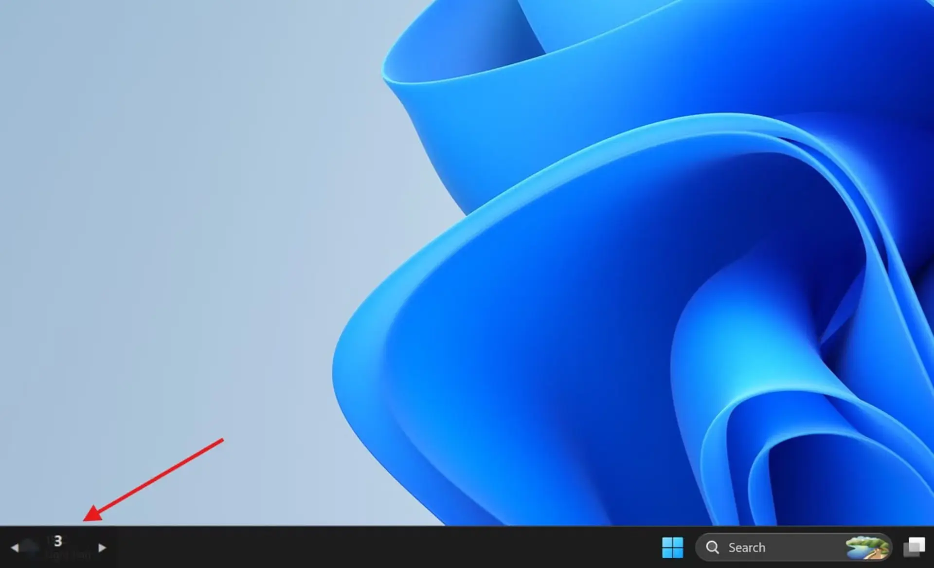 پس‌زمینه آبی و نوار وظیفه (Taskbar) در سیستم‌عامل ویندوز ۱۱