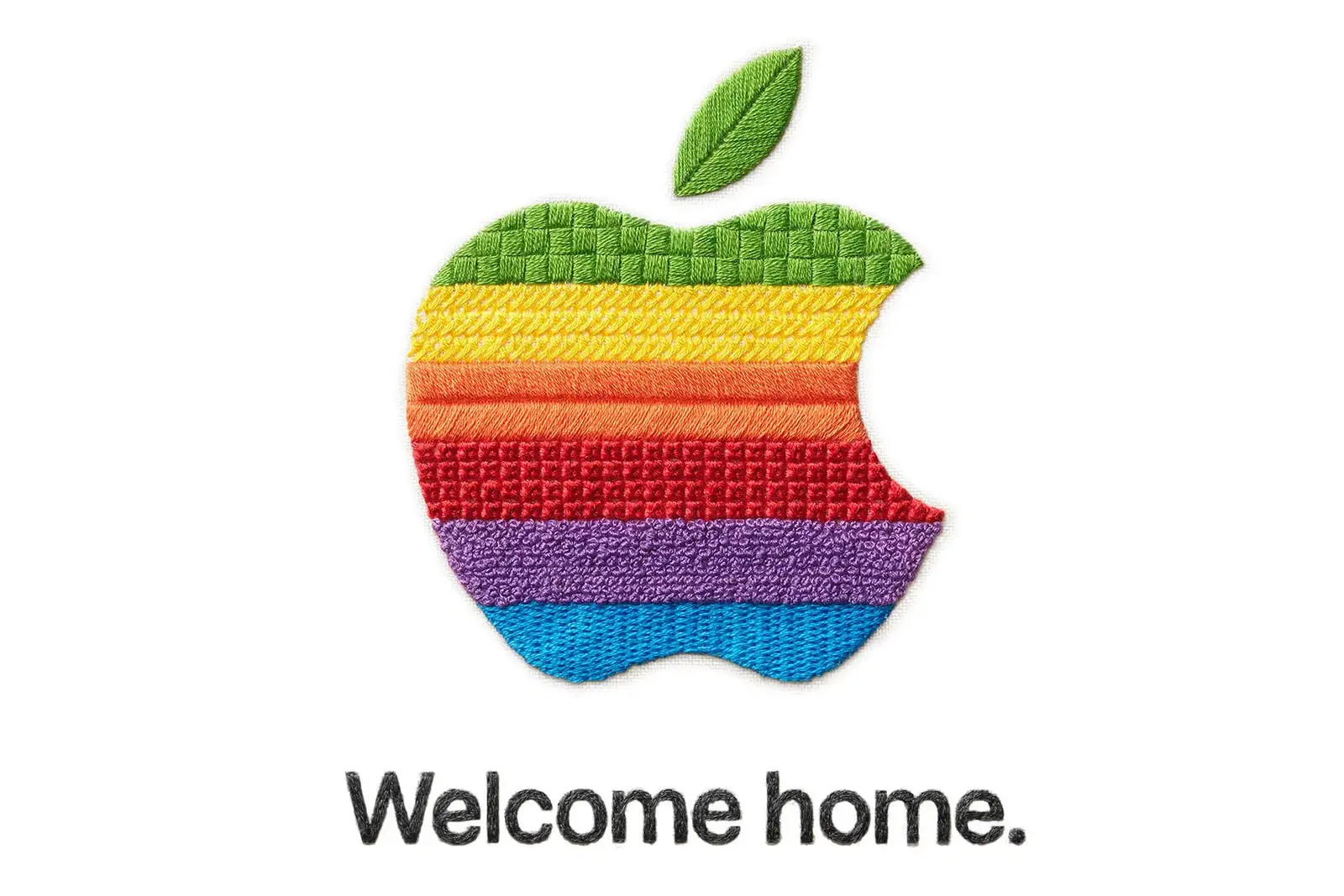 لوگوی رنگین‌کمان اپل (Apple) با بافت گلدوزی شده روی پس‌زمینه سفید
